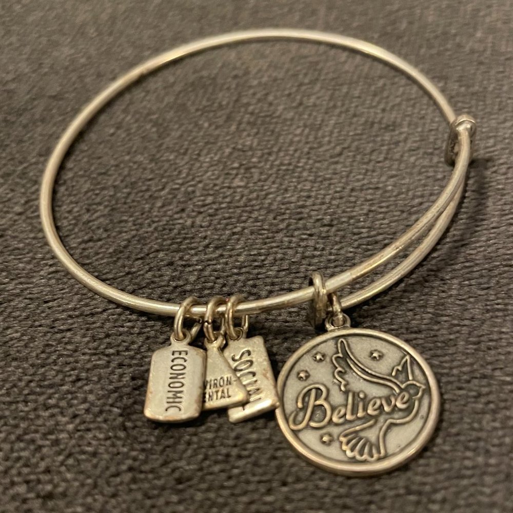 Wind and Fire gold tone bangle charm bracelet